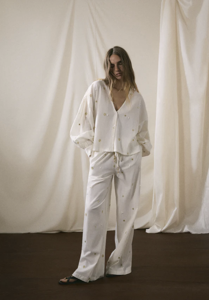 Camisa detalles metálicos